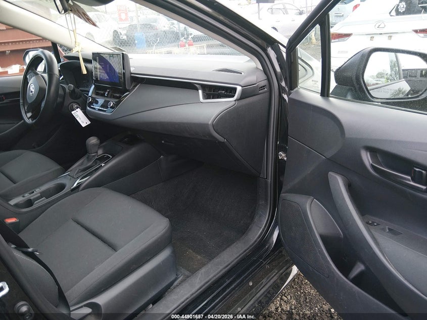 2023 Toyota Corolla VIN 5YFB4MDE0PP042968 IAAI salvage auction — Rear, Salvage, sold $7,250 on 2026-10-19 (photo 5)