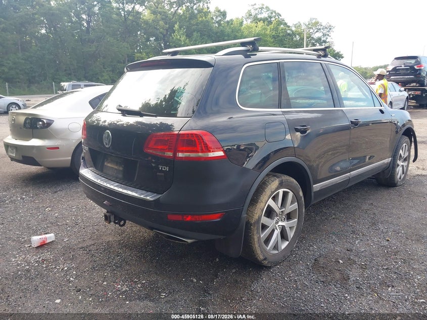2014 Volkswagen Touareg VIN WVGEP9BP8ED009766 IAAI salvage auction — ALL OVER, Clear (Pennsylvania), sold $225 on 2026-08-19 (photo 4)
