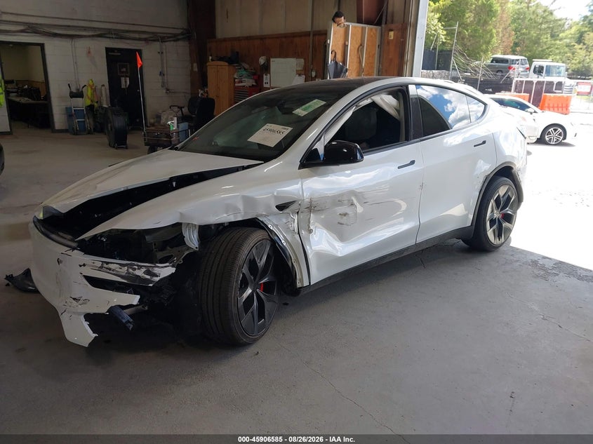 2026 Tesla Model y VIN 7SAYGDET6TA618597 IAAI salvage auction — SUSPENSION, Mv-907A (New York), sold $12,900 on 2026-09-02 (photo 2)