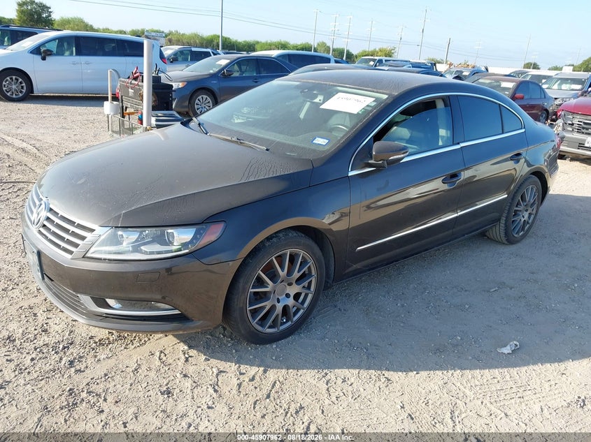 2014 Volkswagen Passat cc VIN WVWBN7AN5EE505295 IAAI salvage auction — NORMAL WEAR, Original (Texas), sold $350 on 2026-08-24 (photo 2)