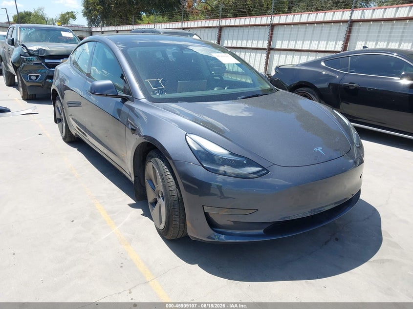 2023 Tesla Model 3 VIN 5YJ3E1EA1PF700191 IAAI salvage auction — REAR END, Original (Texas), sold $8,600 on 2026-10-15 (photo 1)