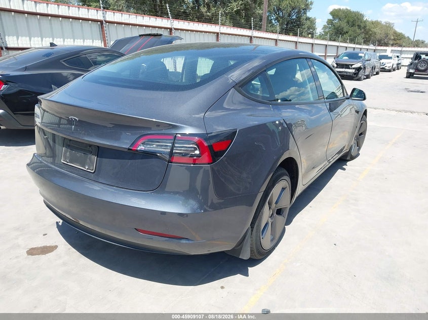 2023 Tesla Model 3 VIN 5YJ3E1EA1PF700191 IAAI salvage auction — REAR END, Original (Texas), sold $8,600 on 2026-10-15 (photo 4)