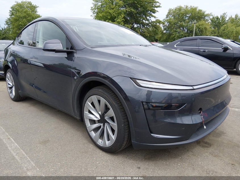 2026 Tesla Model y VIN 7SAYGDEE3TA390463 IAAI salvage auction — REAR END, Salvage Title, sold $21,300 on 2026-09-14 (photo 1)