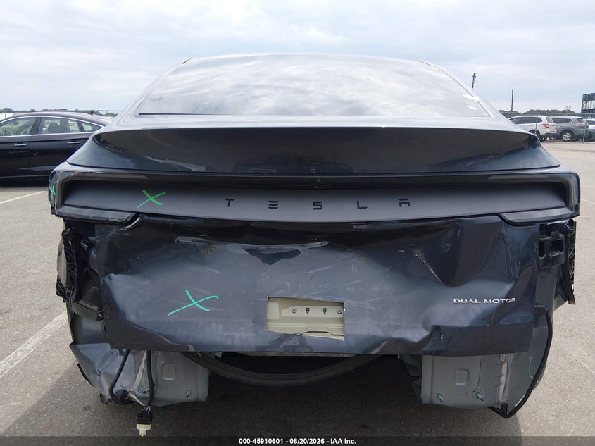 2026 Tesla Model y VIN 7SAYGDEE3TA390463 IAAI salvage auction — REAR END, Salvage Title, sold $21,300 on 2026-09-14 (photo 6)
