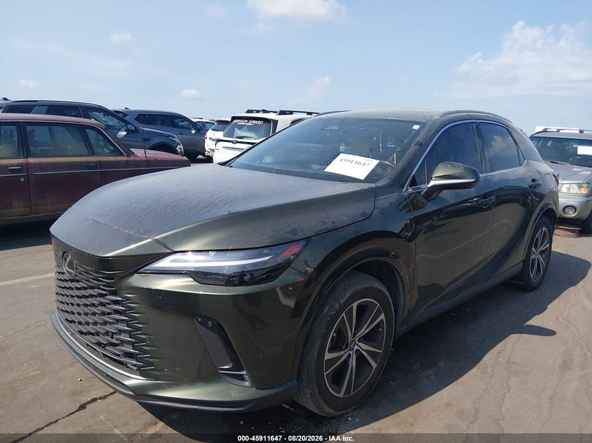 2025 Lexus Rx VIN JTJCHMAA0S2021049 IAAI salvage auction — REAR END, Wait Title, sold $30,250 on 2026-09-23 (photo 2)