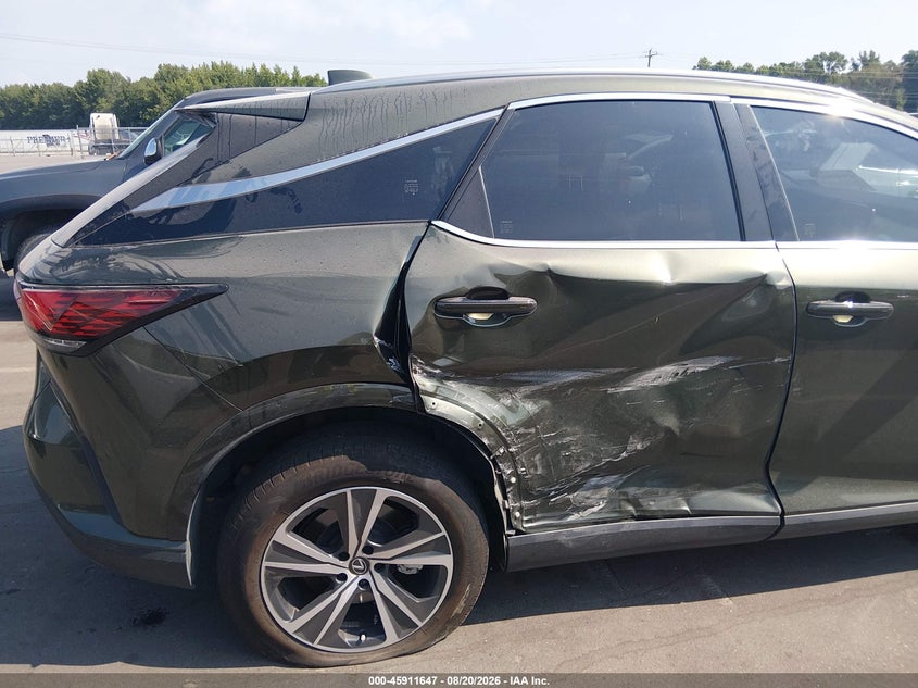 2025 Lexus Rx VIN JTJCHMAA0S2021049 IAAI salvage auction — REAR END, Wait Title, sold $30,250 on 2026-09-23 (photo 6)
