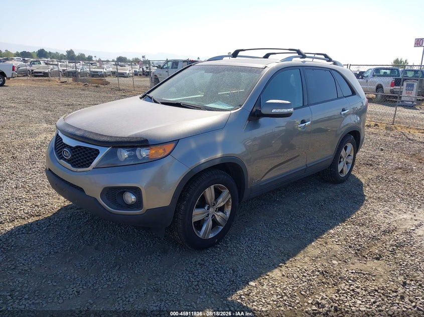 2013 Kia Sorento VIN 5XYKUDA22DG411811 IAAI salvage auction — NORMAL WEAR, Clear - Public Restricted (Oregon), sold $925 on 2026-08-21 (photo 2)