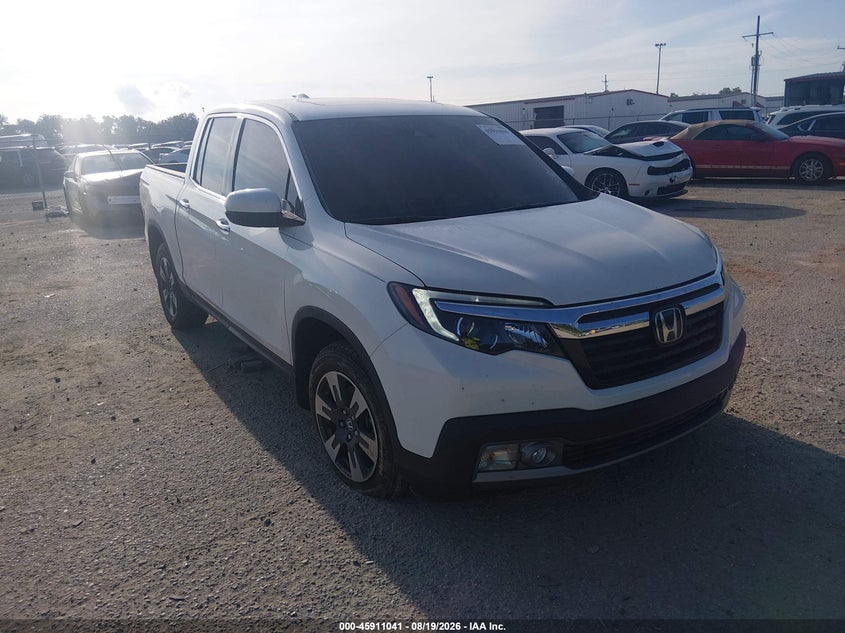 2019 Honda Ridgeline VIN 5FPYK3F70KB013667 — IAAI salvage auction photo