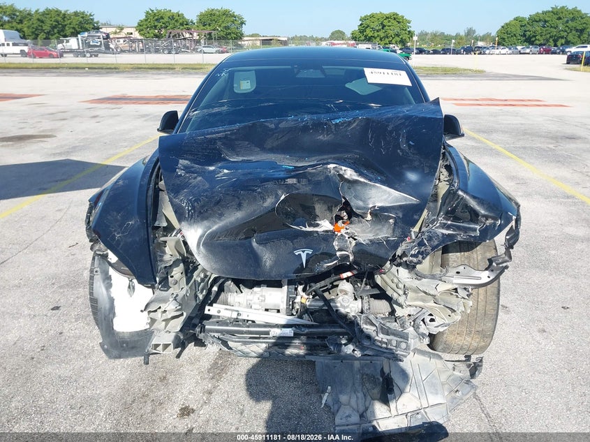 2025 Tesla Model 3 VIN 5YJ3E1EA0SF981117 IAAI salvage auction — FRONT END, Rebuildable (Florida), sold $2,050 on 2026-09-23 (photo 6)