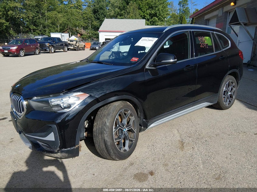 2021 BMW X1 VIN WBXJG9C05M5S28099 IAAI salvage auction — LEFT FRONT, Salvage (Maine), sold $7,000 on 2026-10-05 (photo 2)