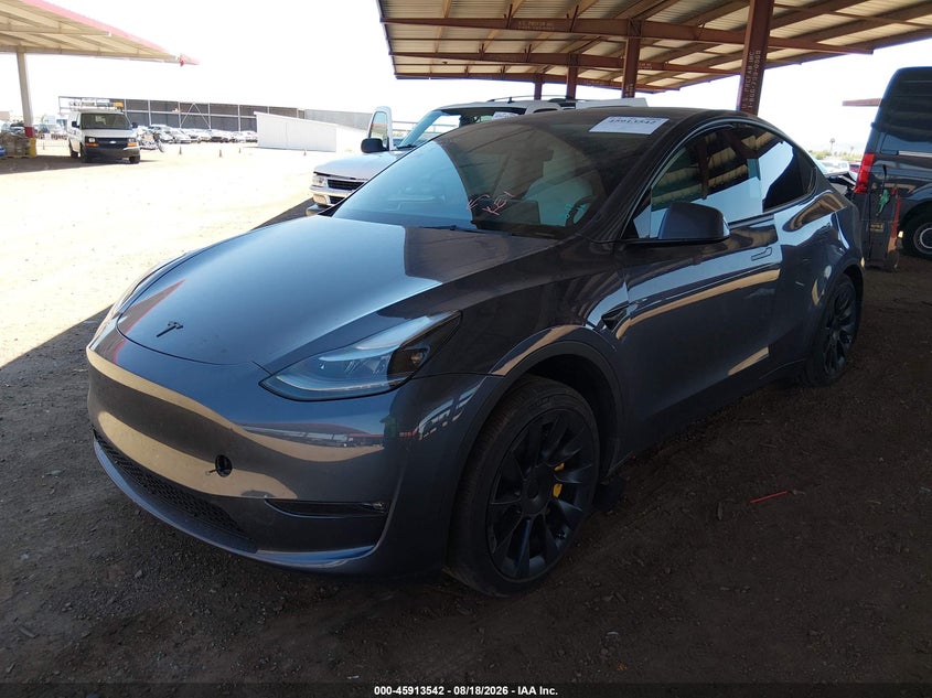 2023 Tesla Model y VIN 7SAYGDEE1PF644762 IAAI salvage auction — RIGHT SIDE, Salvage (Arizona), sold $10,950 on 2026-09-06 (photo 2)
