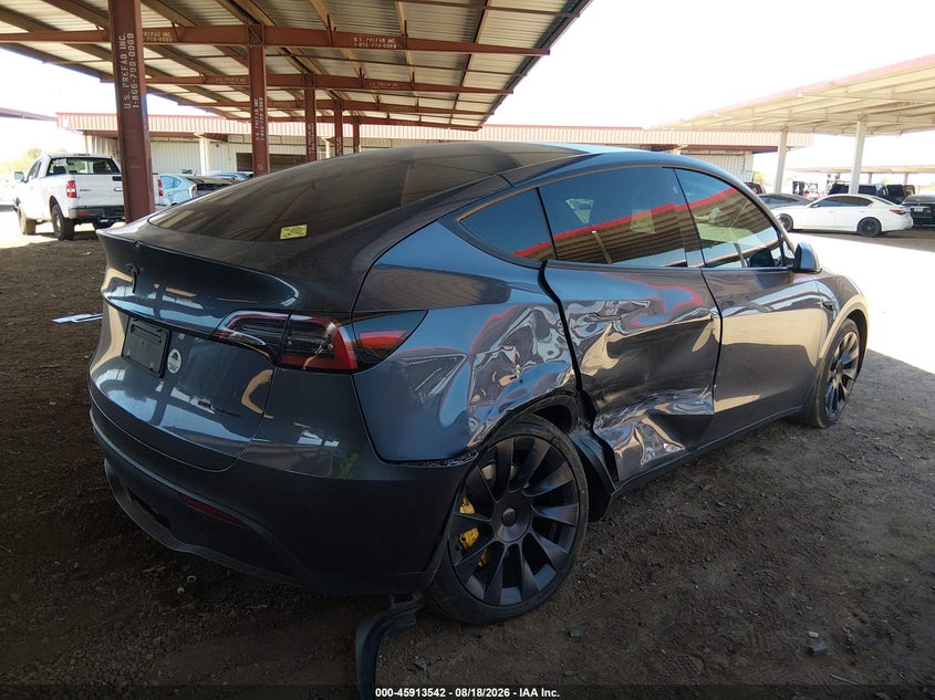 2023 Tesla Model y VIN 7SAYGDEE1PF644762 IAAI salvage auction — RIGHT SIDE, Salvage (Arizona), sold $10,950 on 2026-09-06 (photo 6)