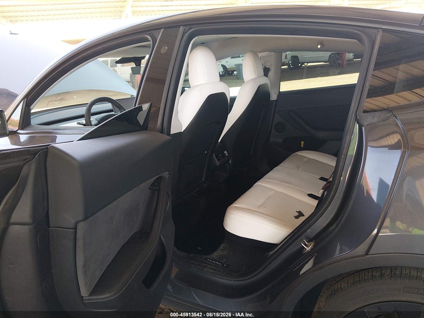 2023 Tesla Model y VIN 7SAYGDEE1PF644762 IAAI salvage auction — RIGHT SIDE, Salvage (Arizona), sold $10,950 on 2026-09-06 (photo 8)
