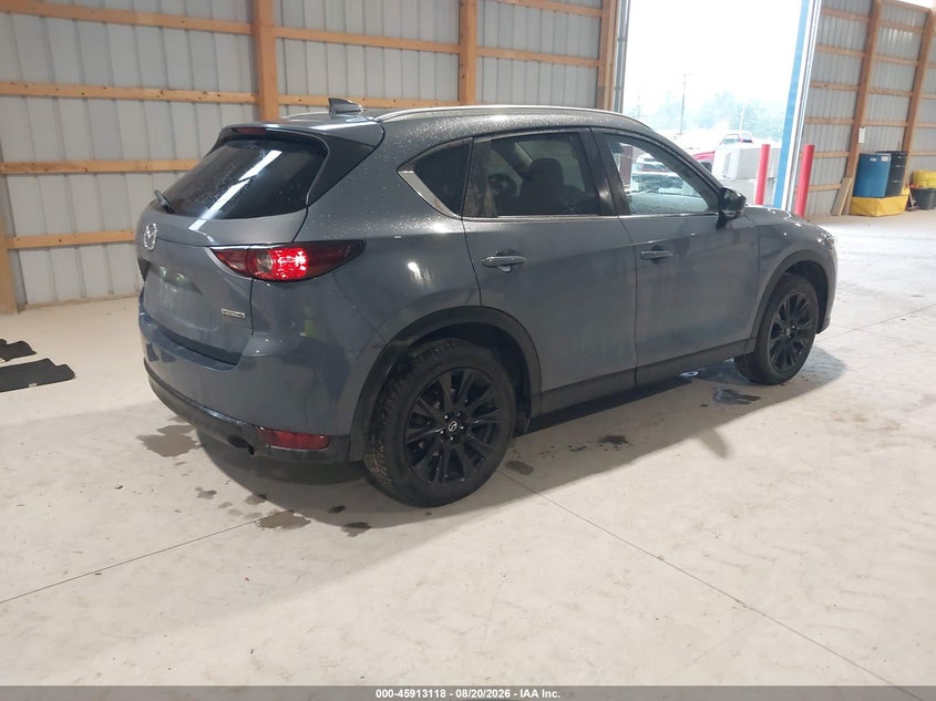 2021 Mazda Cx-5 VIN JM3KFBCM4M0378000 IAAI salvage auction — SIDE, Salvage Title, sold $6,875 on 2026-10-05 (photo 4)