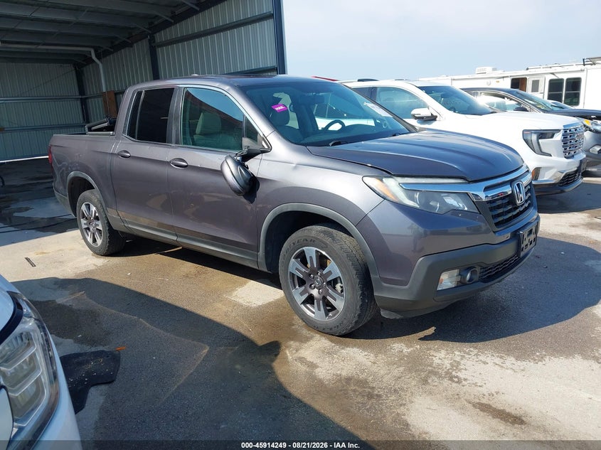 2019 Honda Ridgeline VIN 5FPYK3F6XKB039183 — IAAI salvage auction photo