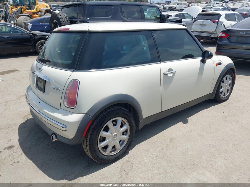 2004 MINI Cooper VIN WMWRC33494TJ55453 IAAI salvage auction — Left Front, Salvage, sold $500 on 2026-10-14 (photo 4)