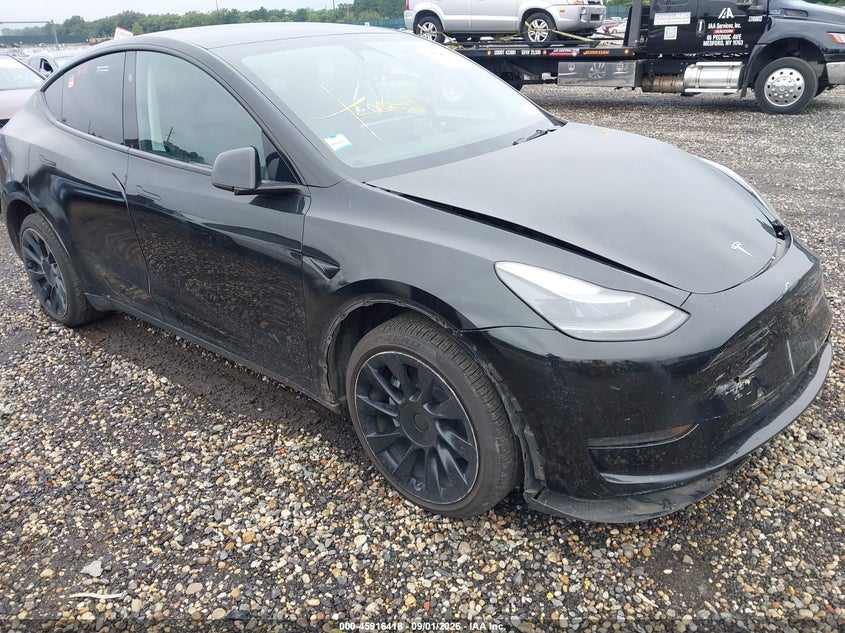 2023 Tesla Model y VIN 7SAYGDEE0PA183390 IAAI salvage auction — FRONT & REAR, Salvage Title, sold $9,500 on 2026-09-06 (photo 1)