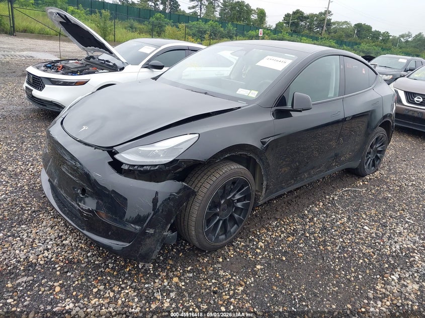 2023 Tesla Model y VIN 7SAYGDEE0PA183390 IAAI salvage auction — FRONT & REAR, Salvage Title, sold $9,500 on 2026-09-06 (photo 2)