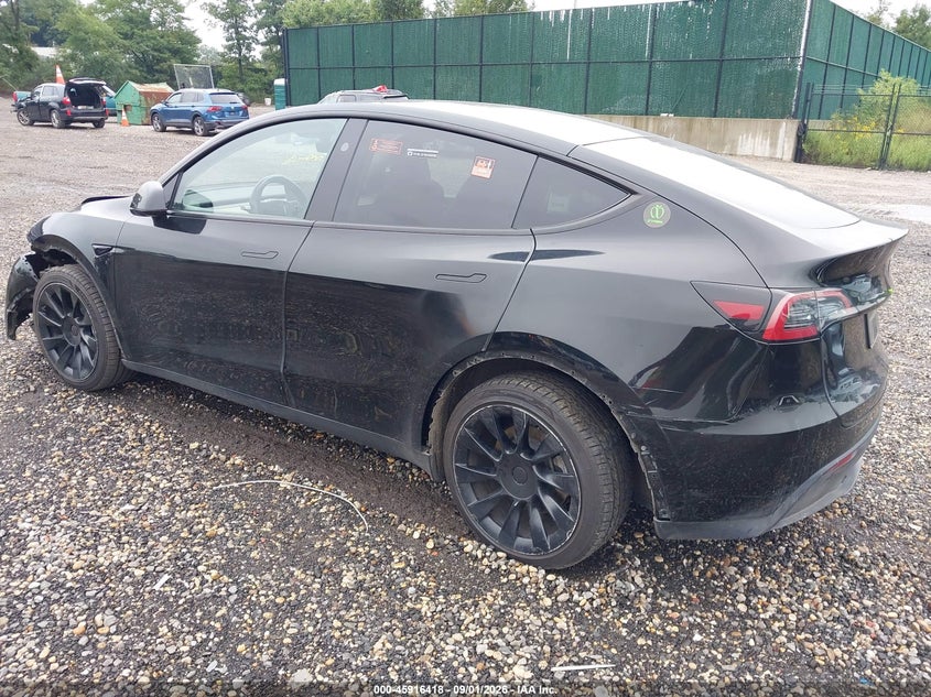 2023 Tesla Model y VIN 7SAYGDEE0PA183390 IAAI salvage auction — FRONT & REAR, Salvage Title, sold $9,500 on 2026-09-06 (photo 3)