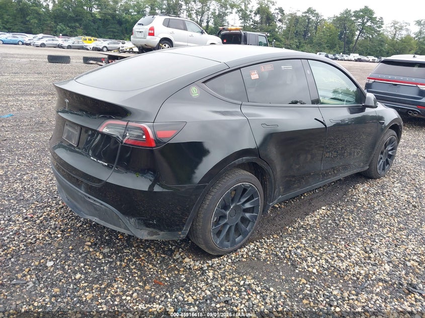 2023 Tesla Model y VIN 7SAYGDEE0PA183390 IAAI salvage auction — FRONT & REAR, Salvage Title, sold $9,500 on 2026-09-06 (photo 4)