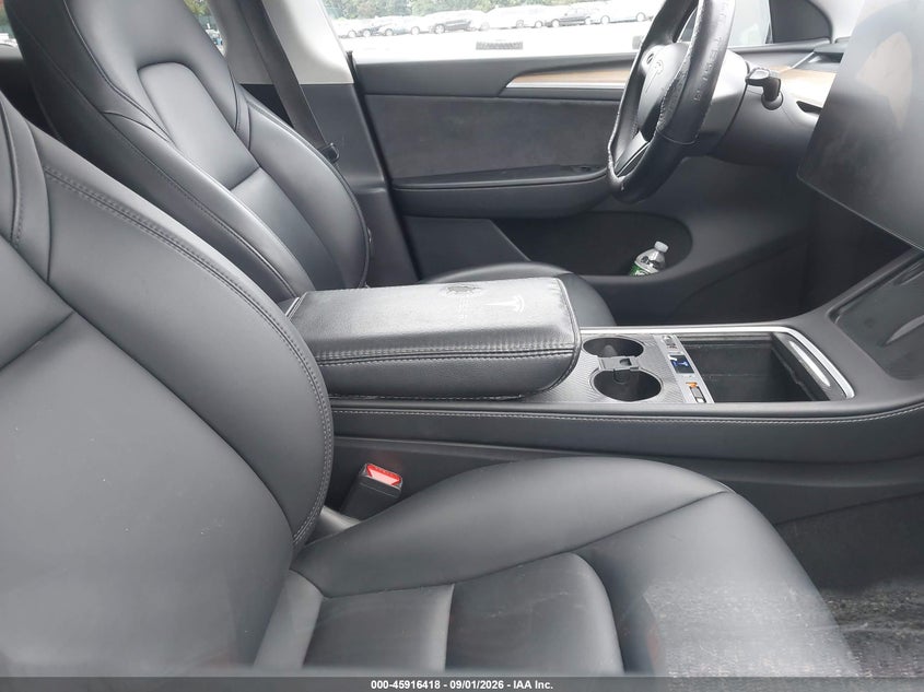 2023 Tesla Model y VIN 7SAYGDEE0PA183390 IAAI salvage auction — FRONT & REAR, Salvage Title, sold $9,500 on 2026-09-06 (photo 5)