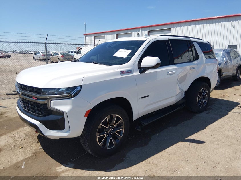 2022 Chevrolet Tahoe VIN 1GNSKPKD4NR246975 IAAI salvage auction — LEFT SIDE, Salvage (Kansas), sold $20,200 on 2026-09-11 (photo 2)