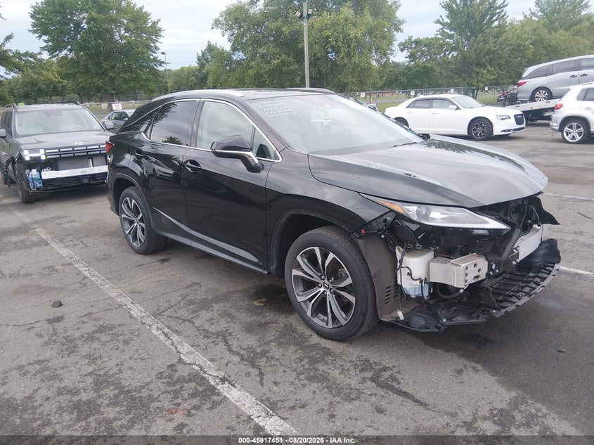 2020 Lexus Rx VIN 2T2HZMDA5LC253579 — IAAI salvage auction photo