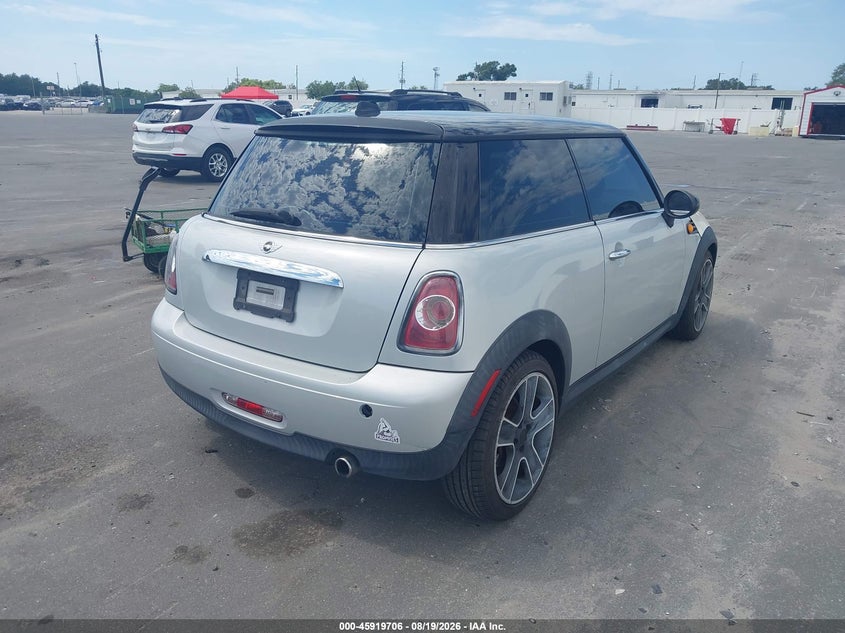 2012 Mini Cooper VIN WMWSU3C56CT369063 IAAI salvage auction — NORMAL WEAR, Clear (Florida), sold $700 on 2026-09-03 (photo 4)