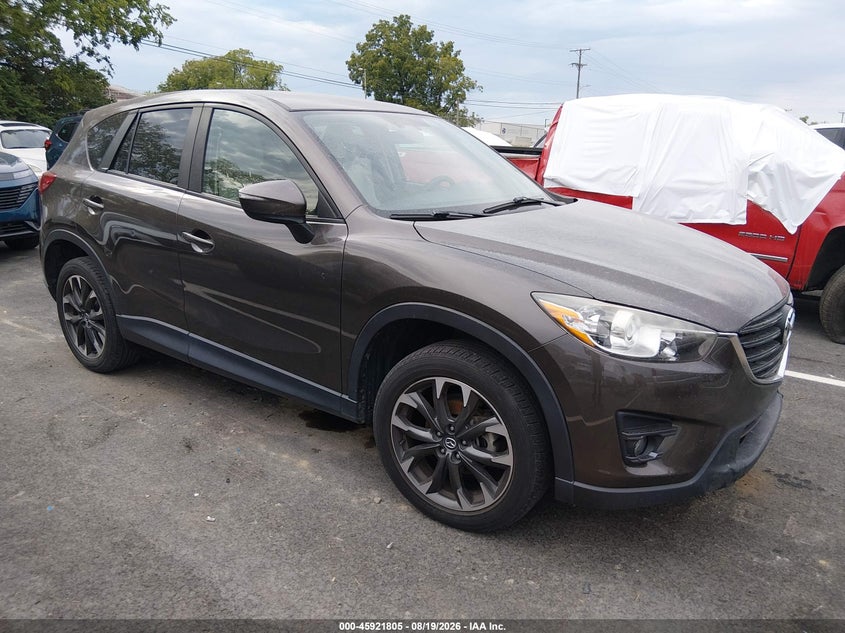 2016 Mazda Cx-5 VIN JM3KE2DY0G0797647 — IAAI salvage auction photo