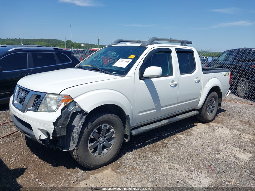 2016 Nissan Navara (frontier) VIN 1N6AD0EV5GN736925 IAAI salvage auction — SIDE, Wait Title, sold $8,150 on 2026-10-13 (photo 2)
