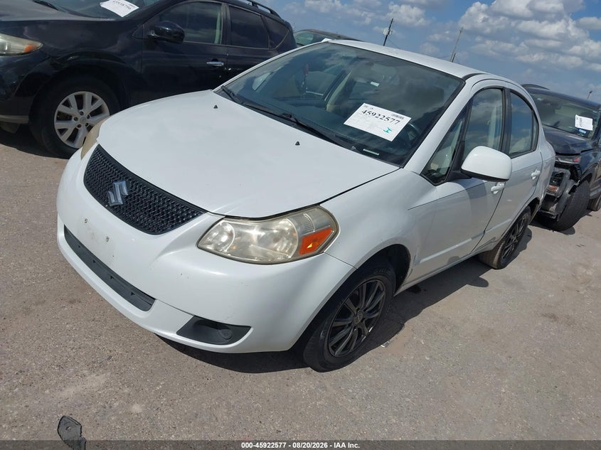 2012 Suzuki Sx4 VIN JS2YC5A38C6300554 IAAI salvage auction — REPOSSESSION, Original (Texas), sold $1,000 on 2026-09-19 (photo 2)