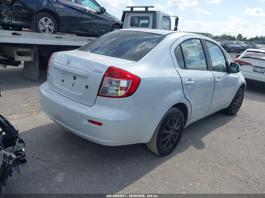 2012 Suzuki Sx4 VIN JS2YC5A38C6300554 IAAI salvage auction — REPOSSESSION, Original (Texas), sold $1,000 on 2026-09-19 (photo 4)