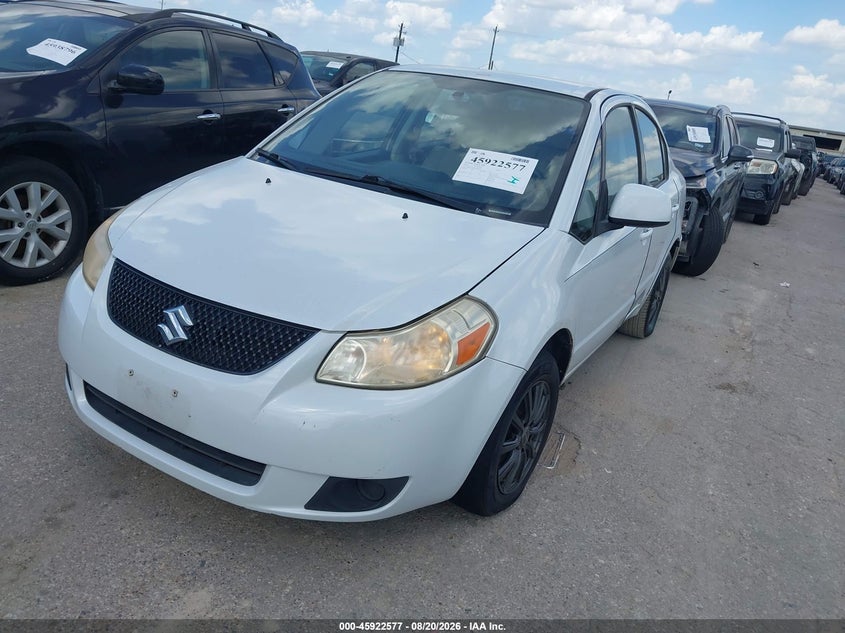 2012 Suzuki Sx4 VIN JS2YC5A38C6300554 IAAI salvage auction — REPOSSESSION, Original (Texas), sold $1,000 on 2026-09-19 (photo 6)