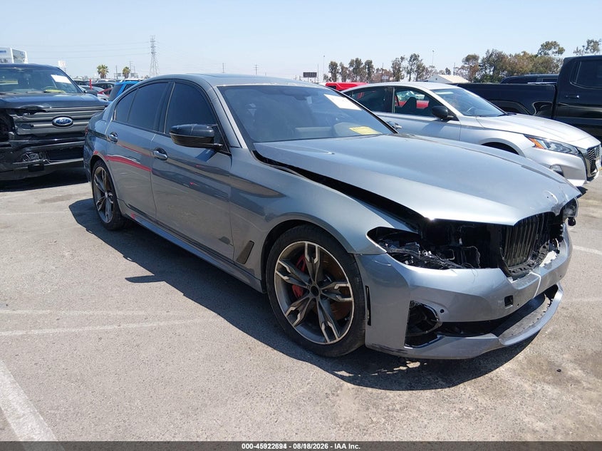 2023 BMW M550i xdrive VIN WBA13BK03PCN80581 — IAAI salvage auction photo
