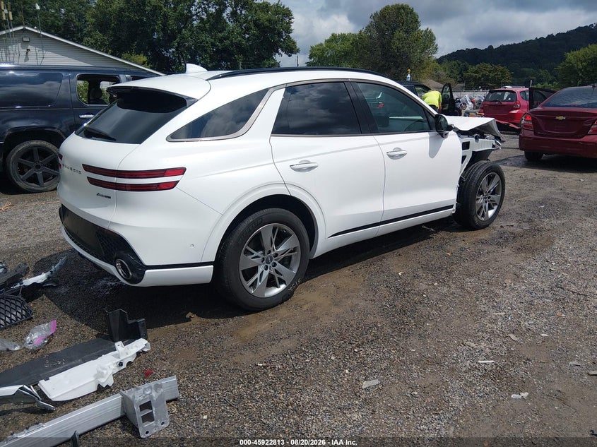 2023 Genesis Gv70 VIN KMUMCDTC0PU133461 IAAI salvage auction — ENGINE DAMAGE, Salvage (Ohio), sold $14,500 on 2026-09-08 (photo 4)