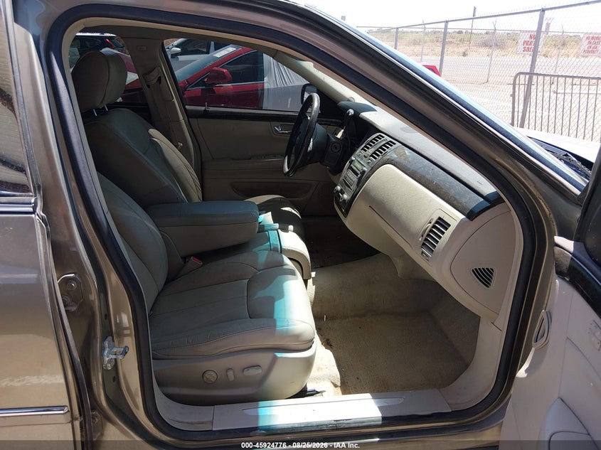 2011 Cadillac Dts VIN 1G6KA5E68BU139954 IAAI salvage auction — LEFT SIDE, Original (Texas), sold $400 on 2026-10-12 (photo 5)