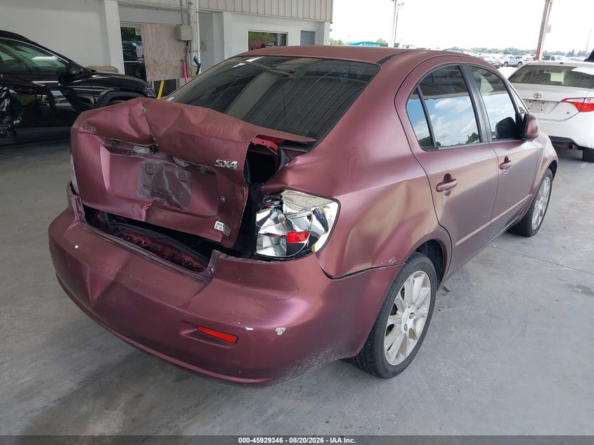 2011 Suzuki Sx4 VIN JS2YC5A27B6303273 IAAI salvage auction — REAR END, Rebuildable (Florida), sold $500 on 2026-09-10 (photo 4)