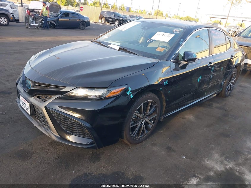 2022 Toyota Camry VIN 4T1G31AK3NU588077 IAAI salvage auction — SIDE, Wait Title, sold $10,600 on 2026-09-02 (photo 2)