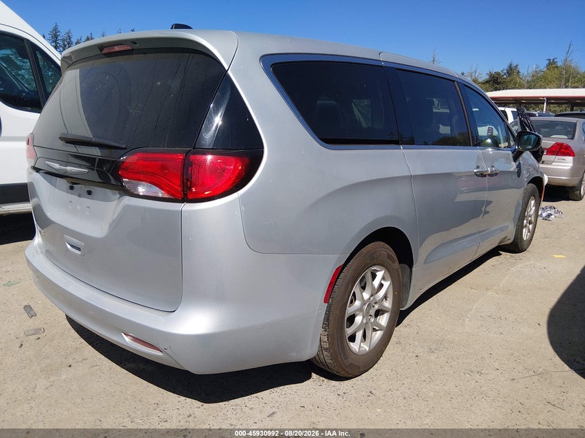 2023 Chrysler Voyager VIN 2C4RC1CG6PR516201 IAAI salvage auction — SIDE, Enterprise Vehicles Clear Only (Florida), sold $10,900 on 2026-08-23 (photo 4)