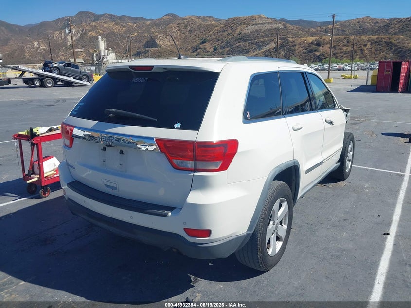 2011 Jeep Grand cherokee VIN 1J4RS4GG1BC661172 IAAI salvage auction — RIGHT FRONT, Salvage (California), sold $1,700 on 2026-08-27 (photo 4)