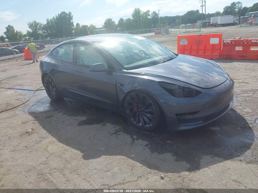 2023 Tesla Model 3 VIN 5YJ3E1EC7PF421006 — IAAI salvage auction photo