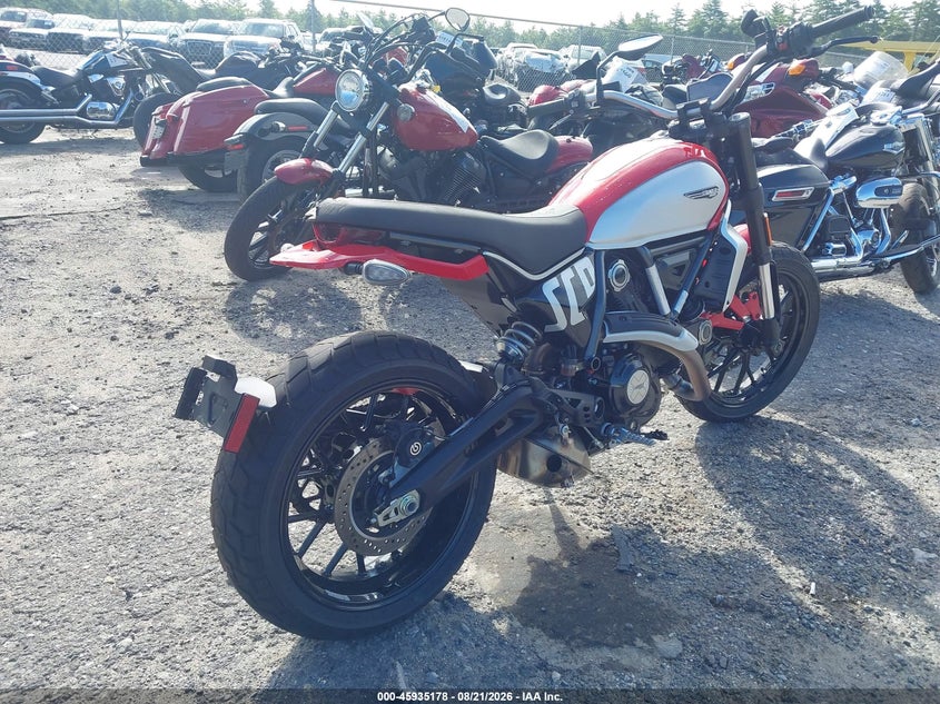 2025 Ducati Scrambler VIN ZDMKAT3M9SB008728 IAAI salvage auction — LEFT SIDE, Salvage Title, sold $1,100 on 2026-10-13 (photo 4)