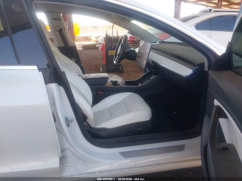 2019 Tesla Model 3 VIN 5YJ3E1EB0KF213601 IAAI salvage auction — NORMAL WEAR, Clear-Dealer Only (Arizona), sold $10,350 on 2026-09-01 (photo 5)