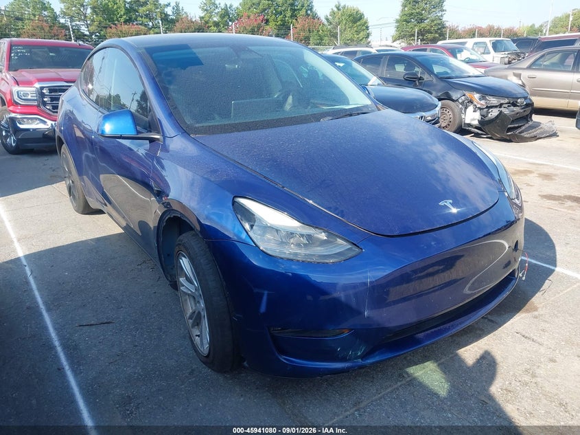2023 Tesla Model y VIN 7SAYGDEEXPF665951 — IAAI salvage auction photo