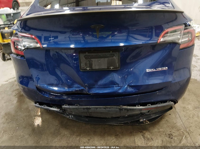 2021 Tesla Model y VIN 5YJYGDEF3MF157631 IAAI salvage auction — REAR END, Salvage Title, sold $11,200 on 2026-10-06 (photo 6)