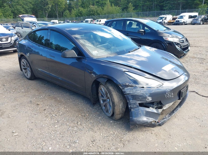 2023 Tesla Model 3 VIN 5YJ3E1EA7PF438340 — IAAI salvage auction photo