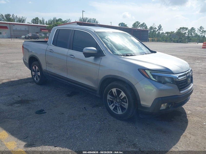 2019 Honda Ridgeline VIN 5FPYK3F67KB000874 — IAAI salvage auction photo