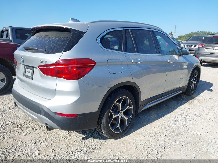 2016 BMW X1 VIN WBXHT3C34GP889052 IAAI salvage auction — WATER/FLOOD, Salvage (Ohio), sold $2,000 on 2026-10-22 (photo 4)