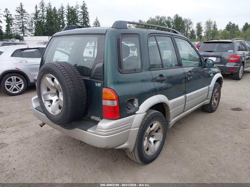 1999 Suzuki Grand vitara VIN JS3TD62V3X4117878 IAAI salvage auction — NORMAL WEAR, Clear (Washington), sold $325 on 2026-09-16 (photo 4)