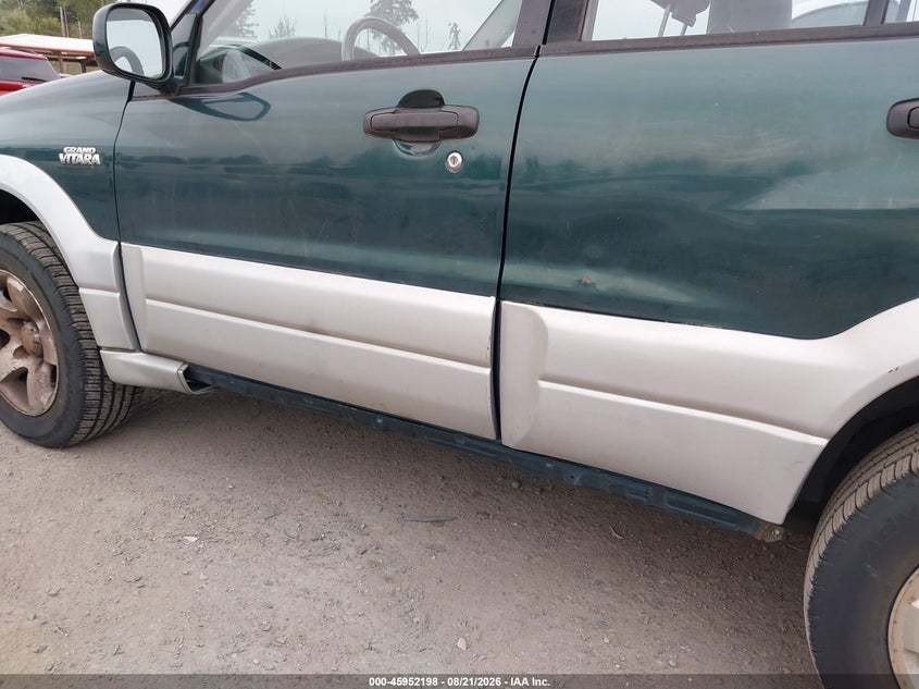 1999 Suzuki Grand vitara VIN JS3TD62V3X4117878 IAAI salvage auction — NORMAL WEAR, Clear (Washington), sold $325 on 2026-09-16 (photo 6)